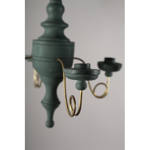 36 - A 16th century Italian design inspired ceiling light in cream wood and scrolled metal with six arms ... 