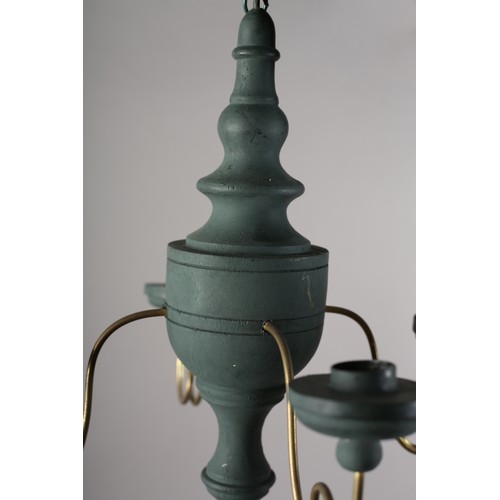 36 - A 16th century Italian design inspired ceiling light in cream wood and scrolled metal with six arms ... 