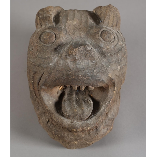 133 - A stone carved gargoyle, 18cm wide x 22cm deep x 28cm high