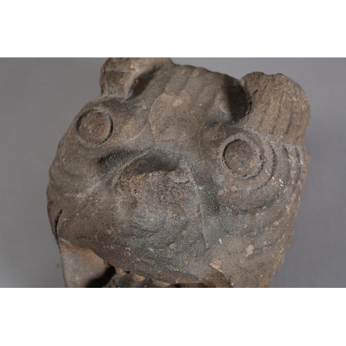 133 - A stone carved gargoyle, 18cm wide x 22cm deep x 28cm high