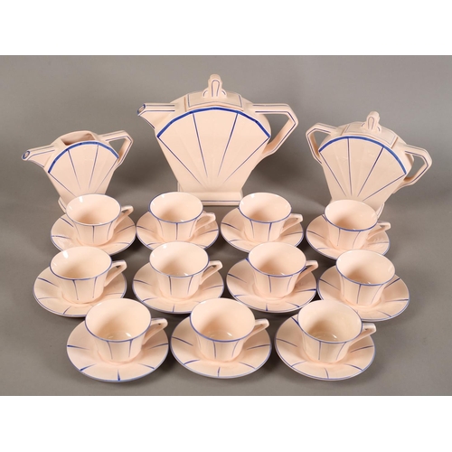 88 - A French Art-Deco pottery tea service by St Amandinoise, the pink fanned fanned body highlighted in ... 