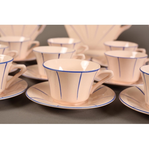 88 - A French Art-Deco pottery tea service by St Amandinoise, the pink fanned fanned body highlighted in ... 