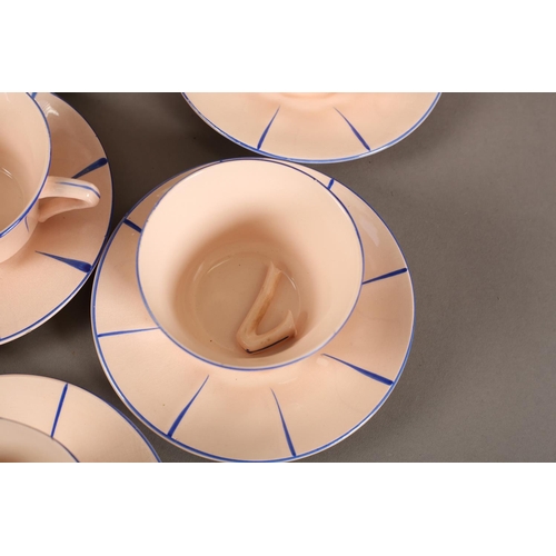 88 - A French Art-Deco pottery tea service by St Amandinoise, the pink fanned fanned body highlighted in ... 