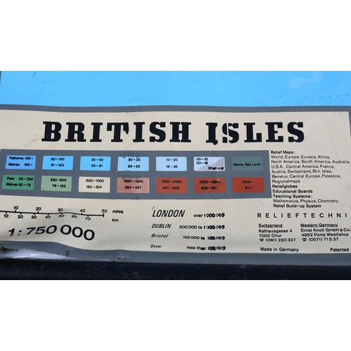 142 - A wall map of the British Isles, c1980s, contoured, plastic, on ebonised poles, 146cm x 135cm