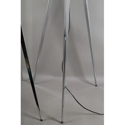 73 - A pair of polished metal floor lamps, by CIMC Home, pierced drum heads with internal off-white shade... 