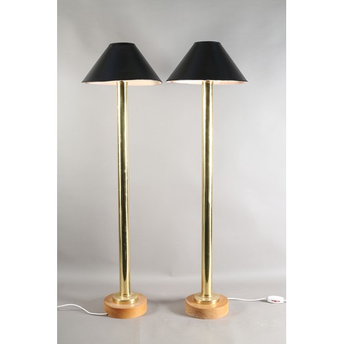 39 - A pair of brass floor lamps c1990s, the plain columns on circular pine bases, 111cm high to fitting