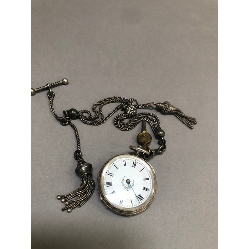 223B - A late 19th century fob watch in a .800 silver open faced case, Swiss cylinder movement, white ename... 