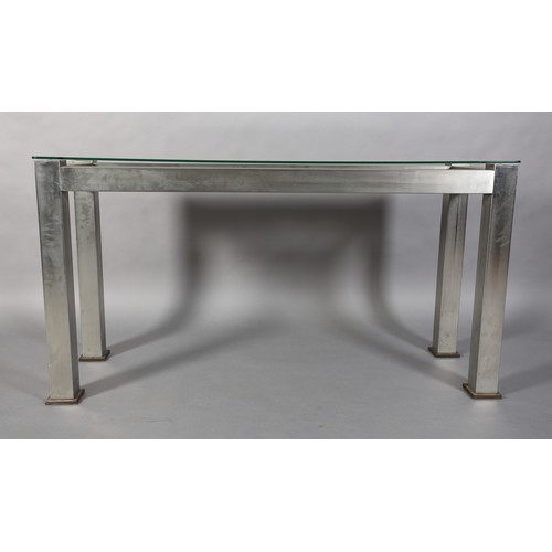 123 - A matt stainless steel console, rectangular, inset with a cast iron open grid, with glass surface 16... 