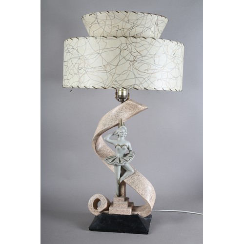 137 - A 1950s chalk ware table lamp modelled as a female dancer and riband, on a square stepped base with ... 