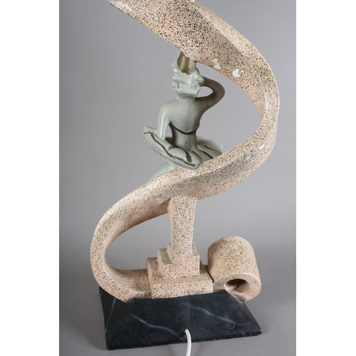 137 - A 1950s chalk ware table lamp modelled as a female dancer and riband, on a square stepped base with ... 