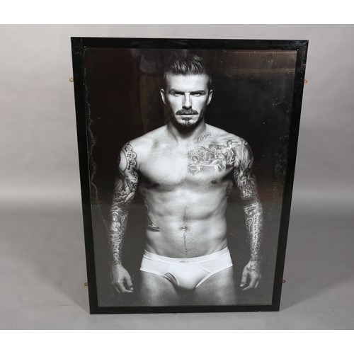 139 - A black and white photographic print of David Beckham, 126cm x 91cm with frame