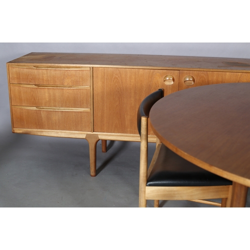 2 - An A H McIntosh of Kirkcaldy, a Dunvegan teak dining suite 1960s, comprising sideboard having a two ... 