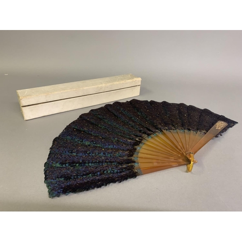 354 - A scarce example of a Himalayan Monal pheasant feather fan, (Lophophorus impejanus), the monture of ... 