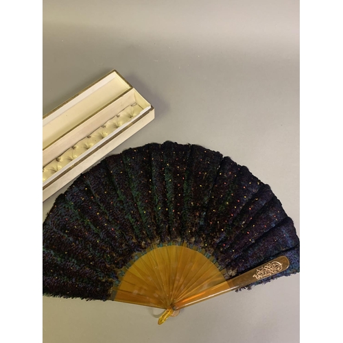 354 - A scarce example of a Himalayan Monal pheasant feather fan, (Lophophorus impejanus), the monture of ... 