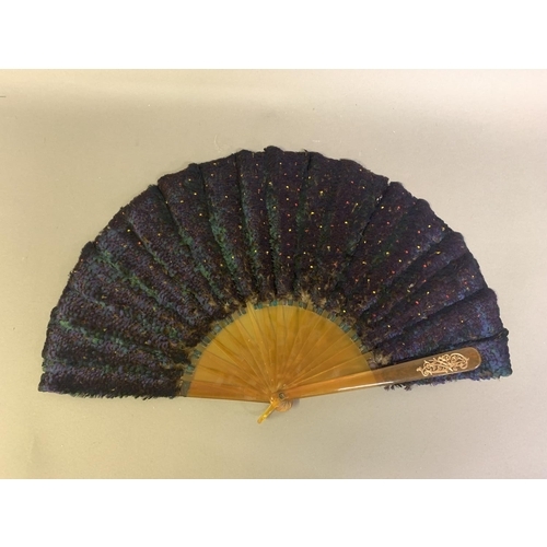 354 - A scarce example of a Himalayan Monal pheasant feather fan, (Lophophorus impejanus), the monture of ... 