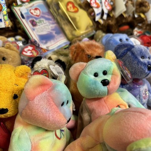 475 - A collection of approximately 62 Ty Beanie Babies, along with 32 editions representing the squads at... 