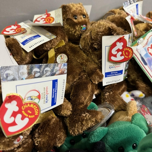 475 - A collection of approximately 62 Ty Beanie Babies, along with 32 editions representing the squads at... 