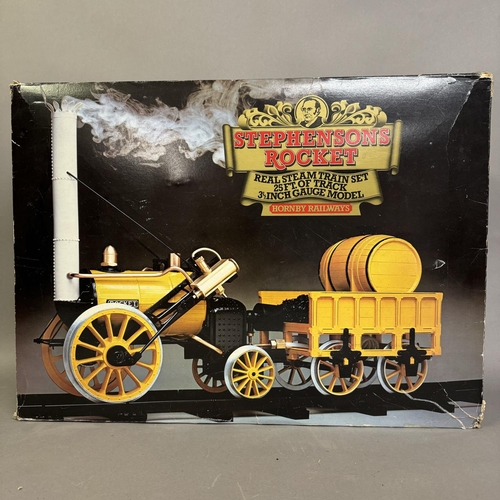 478 - A Hornby 3.5” gauge Stephenson’s Rocket gas-powered, steam operated train set, including all accesso... 