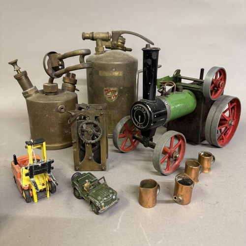 461 - A Mamod TE1 steam-powered traction engine, two brass paraffin torches, a brass-mounted clockwork gea... 