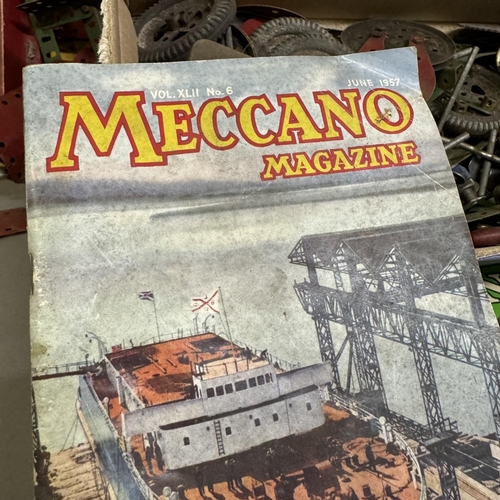 470 - A quantity of Meccano including panels, brackets, girders and shafts, brass gears, worm drives and w... 