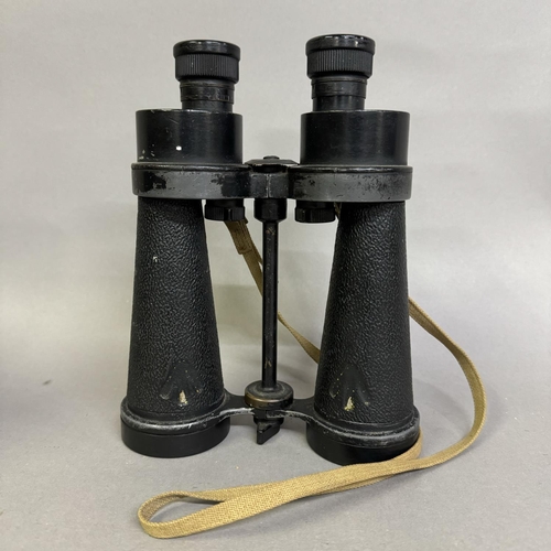 439 - A pair of Barr and Stroud Royal Naval binoculars, model CF41 having 7x magnification and ratchet sto... 