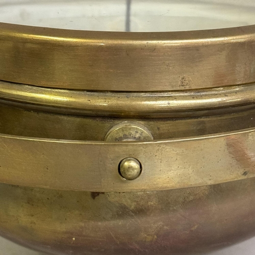 438 - A 19th century ship’s compass with brass body mounted on brass gimbal