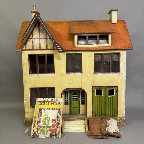 501 - Early 20th century Tudor-style dolls house with integral garage, opening rear, wiring for lighting a... 