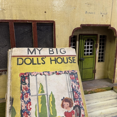 501 - Early 20th century Tudor-style dolls house with integral garage, opening rear, wiring for lighting a... 