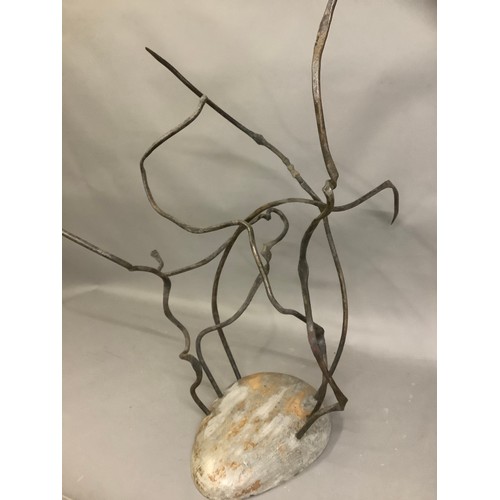 12B - A Spanish abstract sculpture circa 1960's, having tendrils issuing from a smooth carved base, 86cm h... 