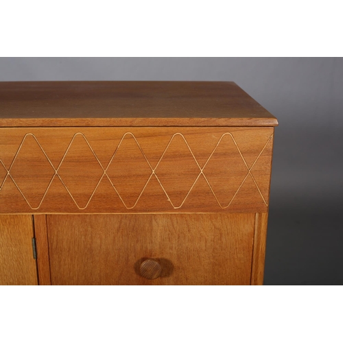 142 - An oak and walnut veneered cabinet having a frieze drawer with incised running wave band design, ove... 