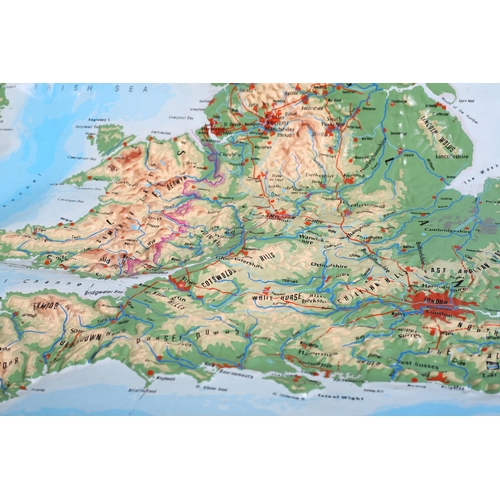 311 - A wall map of the British Isles, c1980s, contoured, plastic, on ebonised poles, 146cm x 135cm