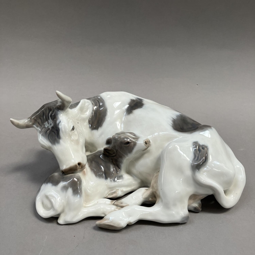 1 - A Royal Copenhagen group of cow and calf modelled by Knud Kyhn, no.800 and mark to underside, 27cm w... 