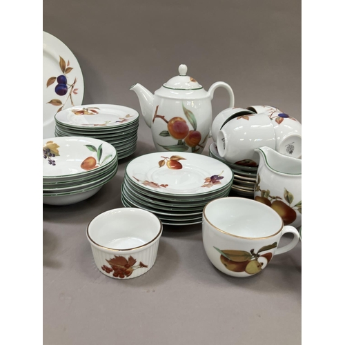 114 - A collection of Royal Worcester Evesham Green comprising, six coffee cups, three teacups, eleven sid... 