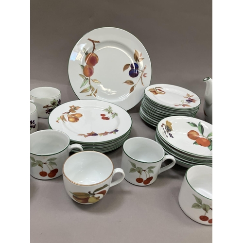 114 - A collection of Royal Worcester Evesham Green comprising, six coffee cups, three teacups, eleven sid... 