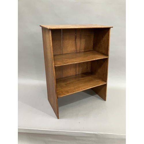 349 - An oak open bookcase of tapered form 54cm x 72cm