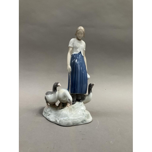 9 - A Bing & Grondahl group of a goose girl with geese, modelled by Axel Locher, no. 2234 and mark to un... 