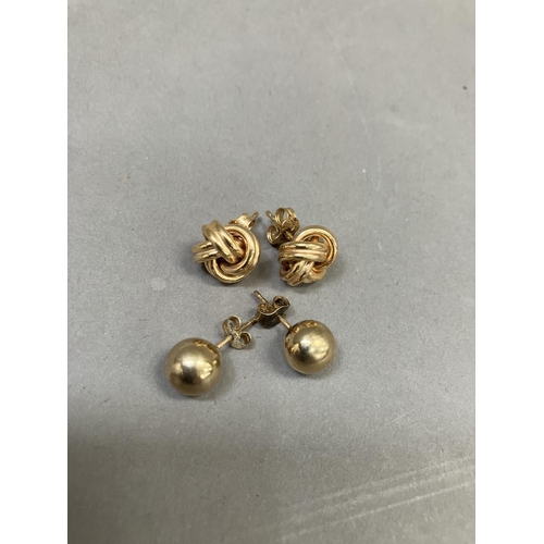 270 - Two pairs of 9ct gold ear studs, total approx. weight 3.5g