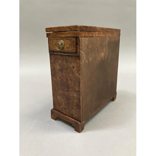 12 - An early 20th century burr walnut and satinwood veneered specimen chest, having a foldover top, twin... 