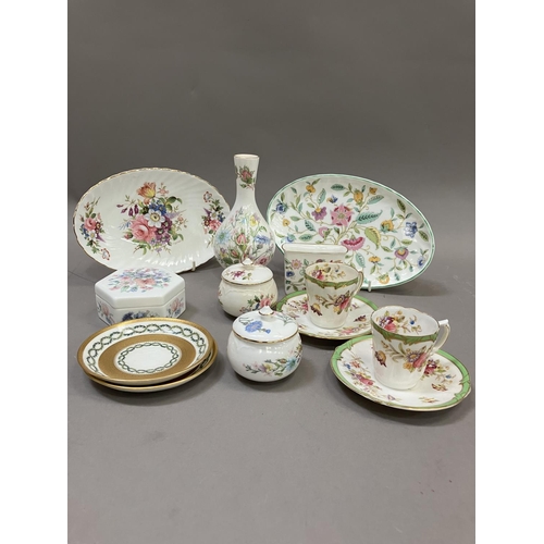 216 - A collection of ceramics painted with flowers, two gilt Minton  saucers, two 19th century cups cabin... 