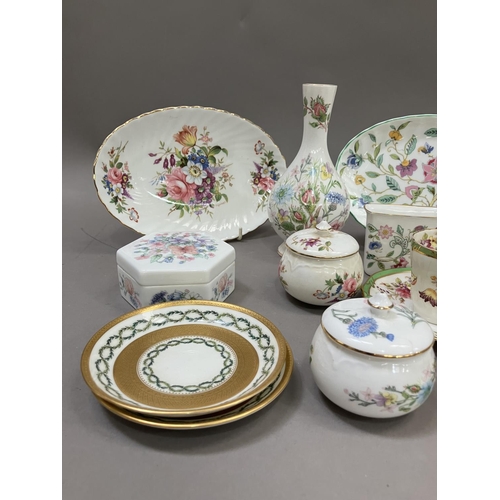 216 - A collection of ceramics painted with flowers, two gilt Minton  saucers, two 19th century cups cabin... 