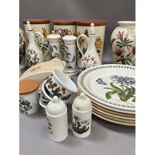 101 - A collection of Portmeirion Botanical Garden pattern tableware comprising six dinner plates, two vas... 