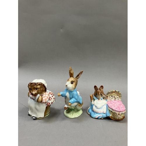 28 - Three Beswick Beatrix Potter figures, 'Mrs Tiggy Winkle', 'Hunca Munca' and Peter Rabbit, all with g... 