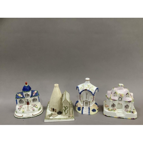 242 - Four Coalport china cottages including The Bottle Oven, Shropshire, The Country Cottage, The Toll Ho... 