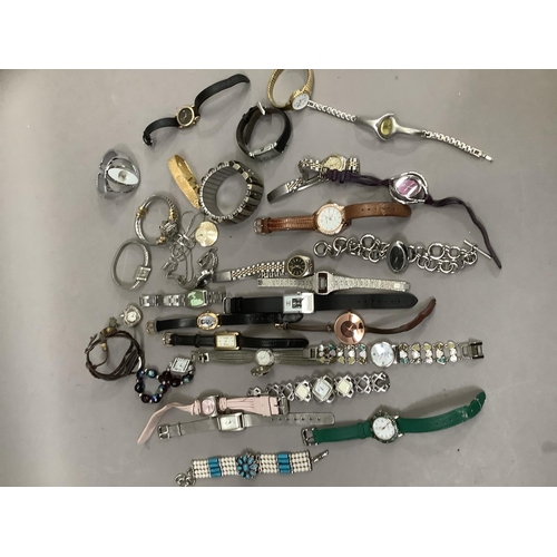 263 - A box of modern dress watches, approximately thirty two