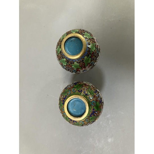 55 - A matched pair of Chinese cloisonné vases enamelled in green, blue, pale rose and deep red, 10.5cm h... 