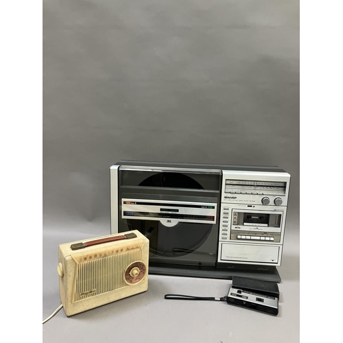 144 - A Sharp VZ-3000 Ghetto Blaster, a Pizon Bros radio and a Kodak Instamatic camera