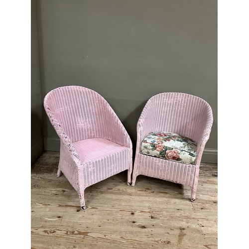 135 - Two Lloyd Loom wicker chairs painted pink, one with label