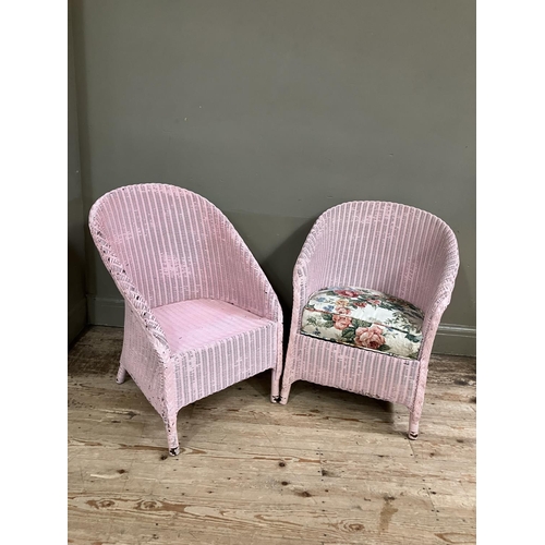 135 - Two Lloyd Loom wicker chairs painted pink, one with label