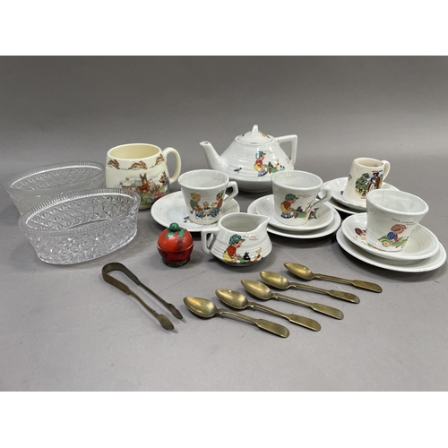 185 - An early 20th century doll's tea set, 'Dollies Bedtime'  comprising three cups, three saucers, teapo... 