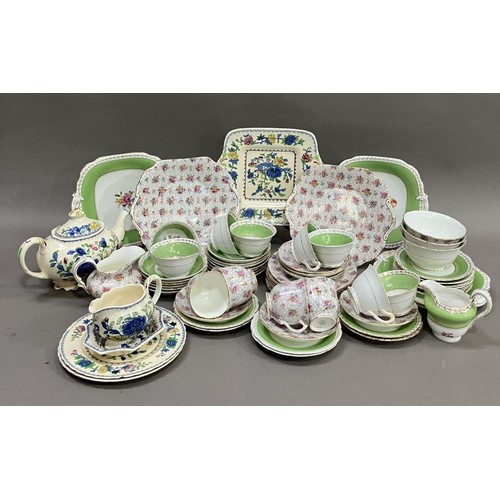 115 - A green and gilt Grosvener tea service comprising eight cups, thirteen saucers, two sugar bowls, mil... 